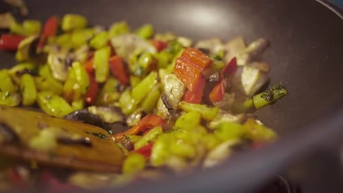 Vegetables Cooking in a Pan with Spatula