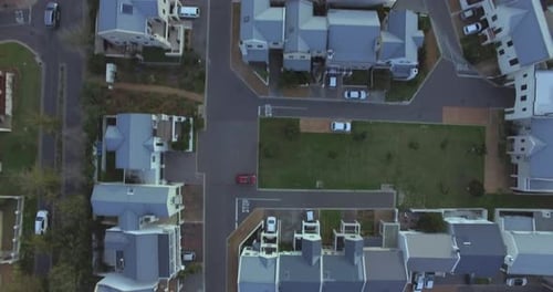 Birds Eye View of Suburban Neighborhood with Cars