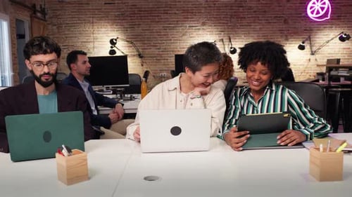 Diverse Team Working Together in Modern Office