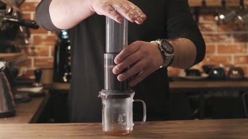 Brewing Coffee with Aeropress in Kitchen