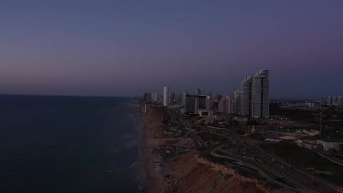 Aerial view of the city of Netanya and its coastline - part of the Israeli coastal plain, at sunset