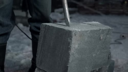 Close Up of Drilling a Cement Block Clip Industrial Works at the Construction Site