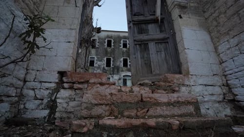Large Stone Gate at Entrance of Old Abandoned Great House, Silent and Empty, Rich in History