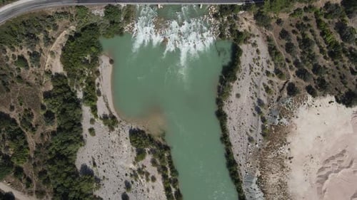 River Flowing Through a Natural Landscape Aerial View