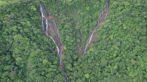Beautiful waterfall in dense forest in Costa Rica_4K