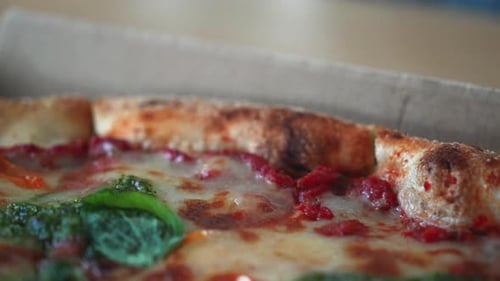 Close Up of Delicious Pizza in a Box