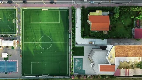 Aerial View of Soccer Field in Urban Setting