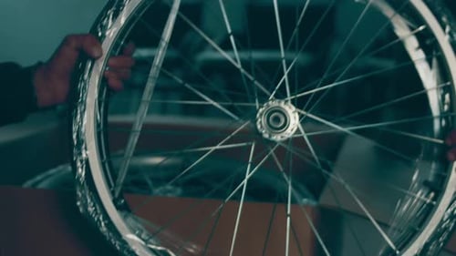 A Disabled Man Assembles a Stroller