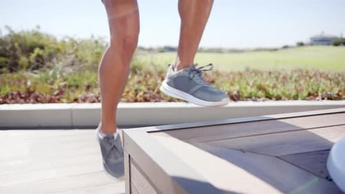 Legs Exercising Outdoors with Step Aerobics