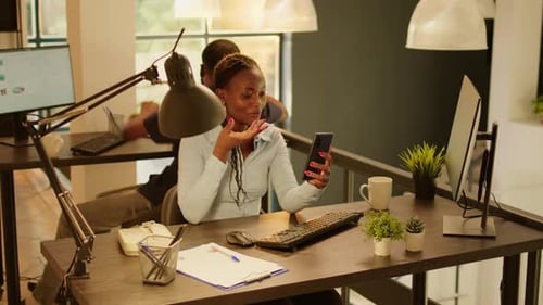 Office Worker Talking on Remote Videoconference Call