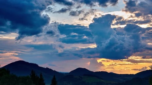 Epic Clouds At Sunset Over The Forest Landscape
