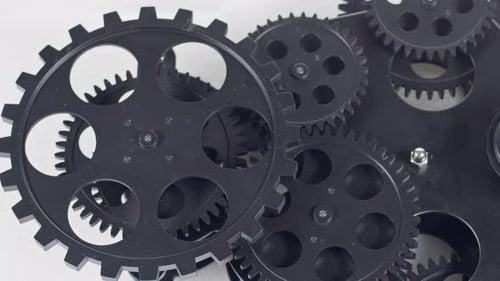 Rotating Black Gears Close Up