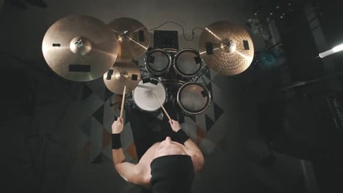 Top Down View of Professional Drummer Playing Drums