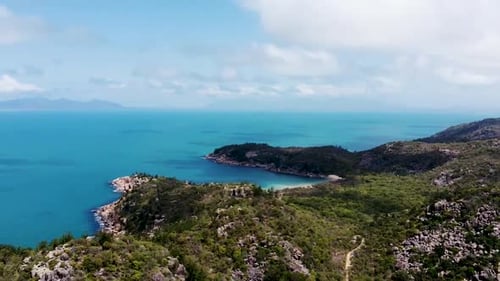 Drone panning to the left with bays and islands in the background