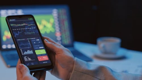 Woman Holding Smartphone with Crypto App