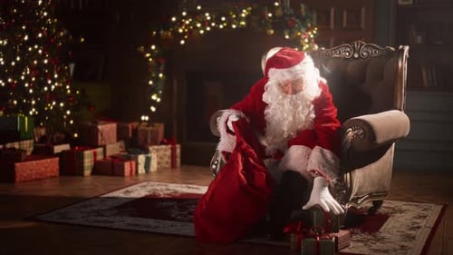 Santa Claus Taking Gift from Bag on Christmas