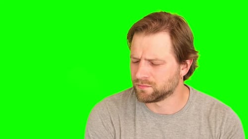 Upset Man Over Plain Green Background Adult Bearded Fun Confused Shy Shamed Bemused Guy Green Screen