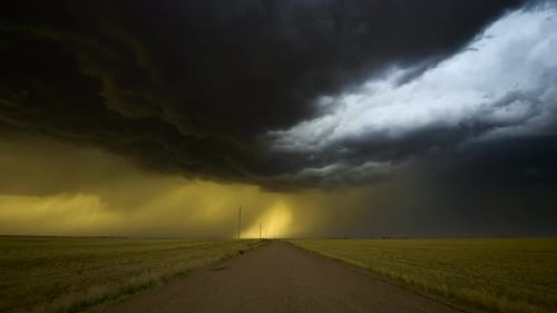 Road Leading To Scary Electrified Summer Storm