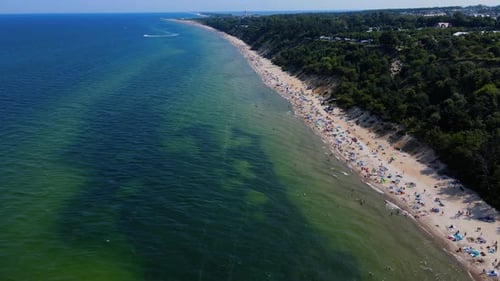 Aerial View of Baltic Sea Beach with Swimming People in Wladyslawowo Poland