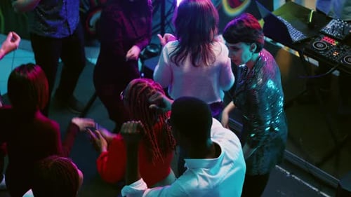 Group of Young People Partying at Club