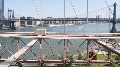 New York City Manhattan Bridge From Brooklyn Bridge USA NYC Skyline Cityscape East River Water