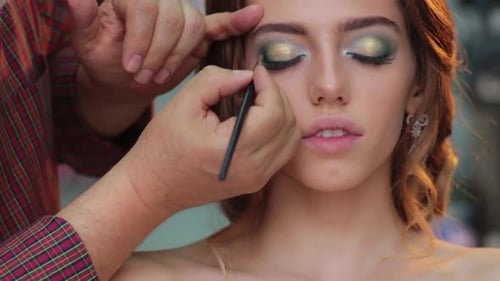 Makeup Artist Applying Eyeshadow for Beauty Makeup Model Closeup Eyes Eyeshadow Beautiful Young