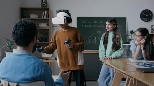 Students Using VR Headset in Classroom with Teacher