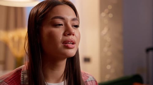 Woman Crying with Tears Streaming Down Her Face