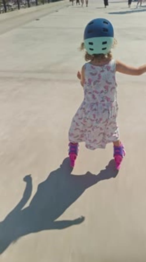 Small Girl Roller Skating in Vertical