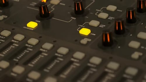 Working on a large sound mixer