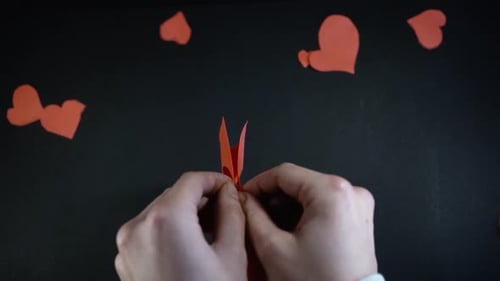 Hands Making Heart Shaped Valentine's Day Card