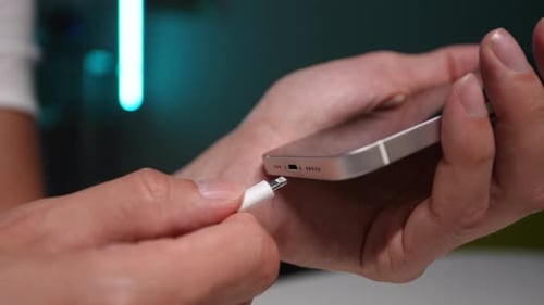 Close Up of Charger Plugged Into a Smartphone