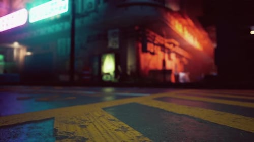 A Bustling City Street Corner at Night with Blurred Lights and Movement