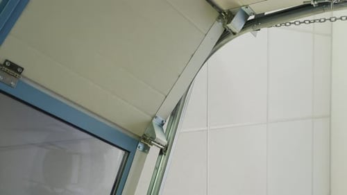 Closeup of Automatically Opening Garage Doors