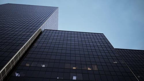 Dusk City Skyline with Tall Reflective Glass Skyscrapers