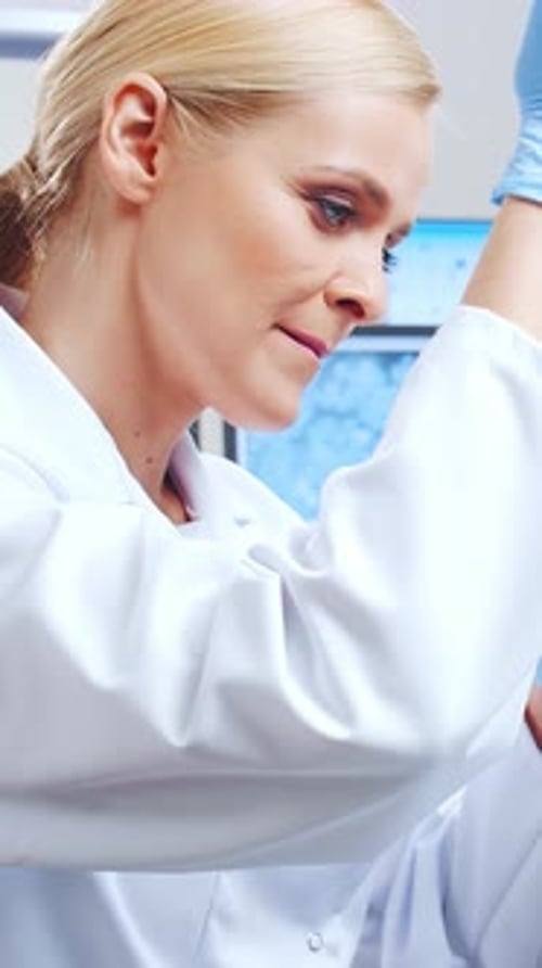 Woman Scientist Working in Modern Research Laboratory