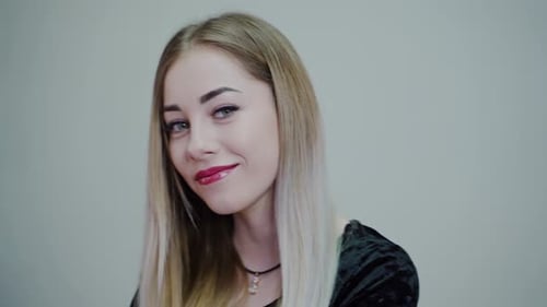 Beautiful spa model. Girl with perfect fresh clean skin. A blonde woman is looking at the camera