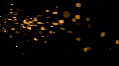 Dynamic Golden Bokeh Sparks Flying Overlay