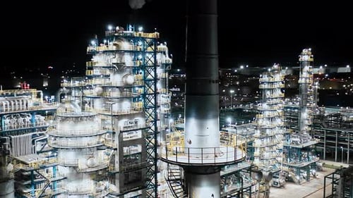 Aerial view of chimneys of power plant, an industrial district. Modern large thermal power plant