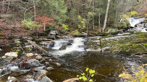 Water descends along rocks in a cascading river