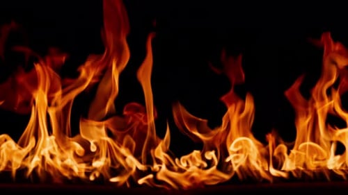 Burning Flames in Dark Background, Close Up