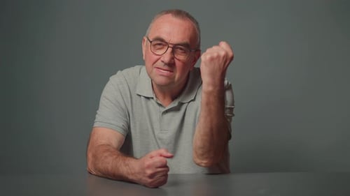 Man Raises His Fist in Anger During Argument
