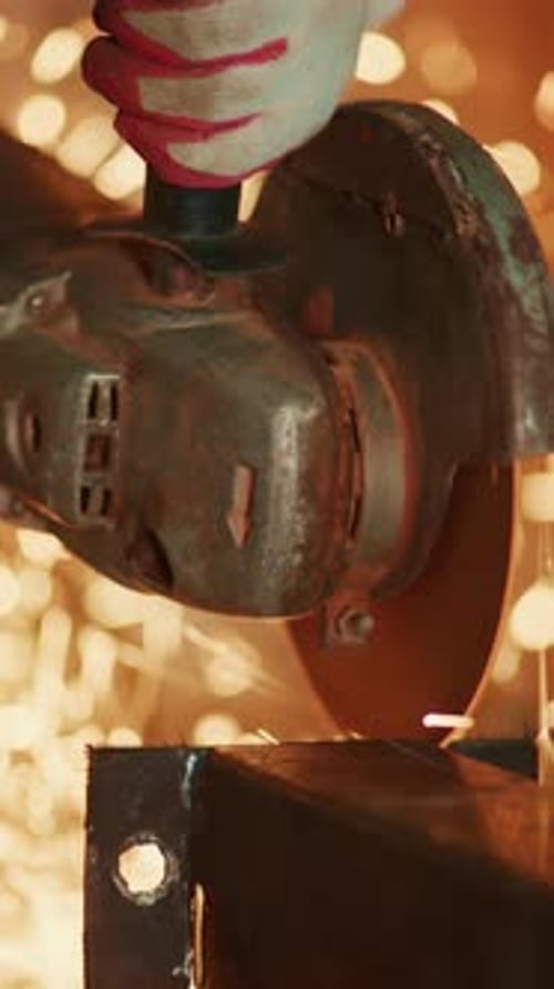 A Craftsman’s Precision Sparks Fly As a Grinder Powers Through Metal Demonstrating Skill in
