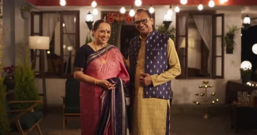 Senior Couple Smiling Together in Festive Home Setting