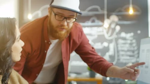 Beautiful Woman Developer Uses Personal Computer and Talks With a Programer, Together They Design N