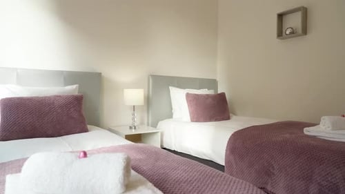 Modern Cozy Bedroom with a Simple Design with a Bed for Rest and Sleep Upward Movement