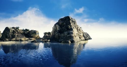 Scenic Coastal View Featuring a Rocky Island Under Bright Blue Sky