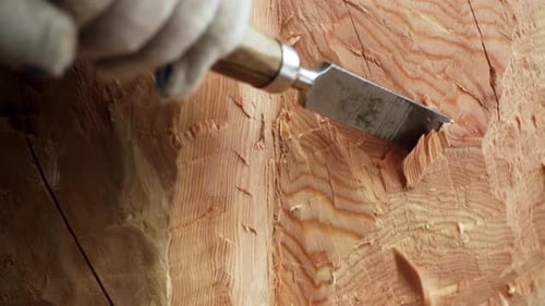 Wood Carving with Chisel Close Up