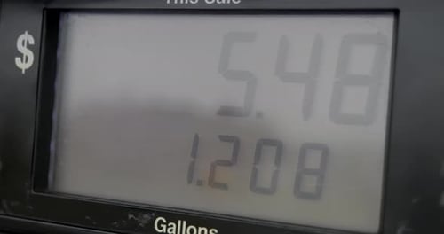 Gas station pump screen filling up and pumping slowly from over a gallon to 8 dollars worth of fuel.