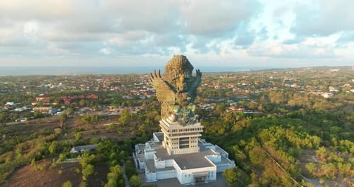 Drone Aerial view 4k Statue of Vishnu in Garuda Wisnu Kencana Cultural Park.